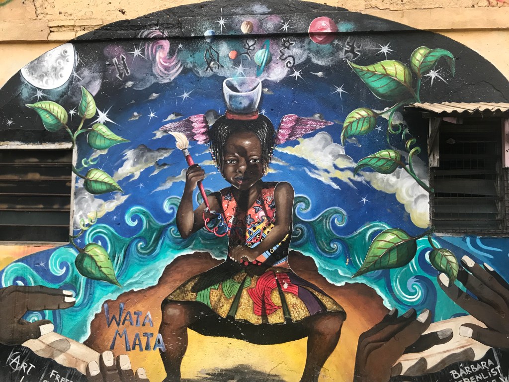 A bright mural painting in Jamestown Accra