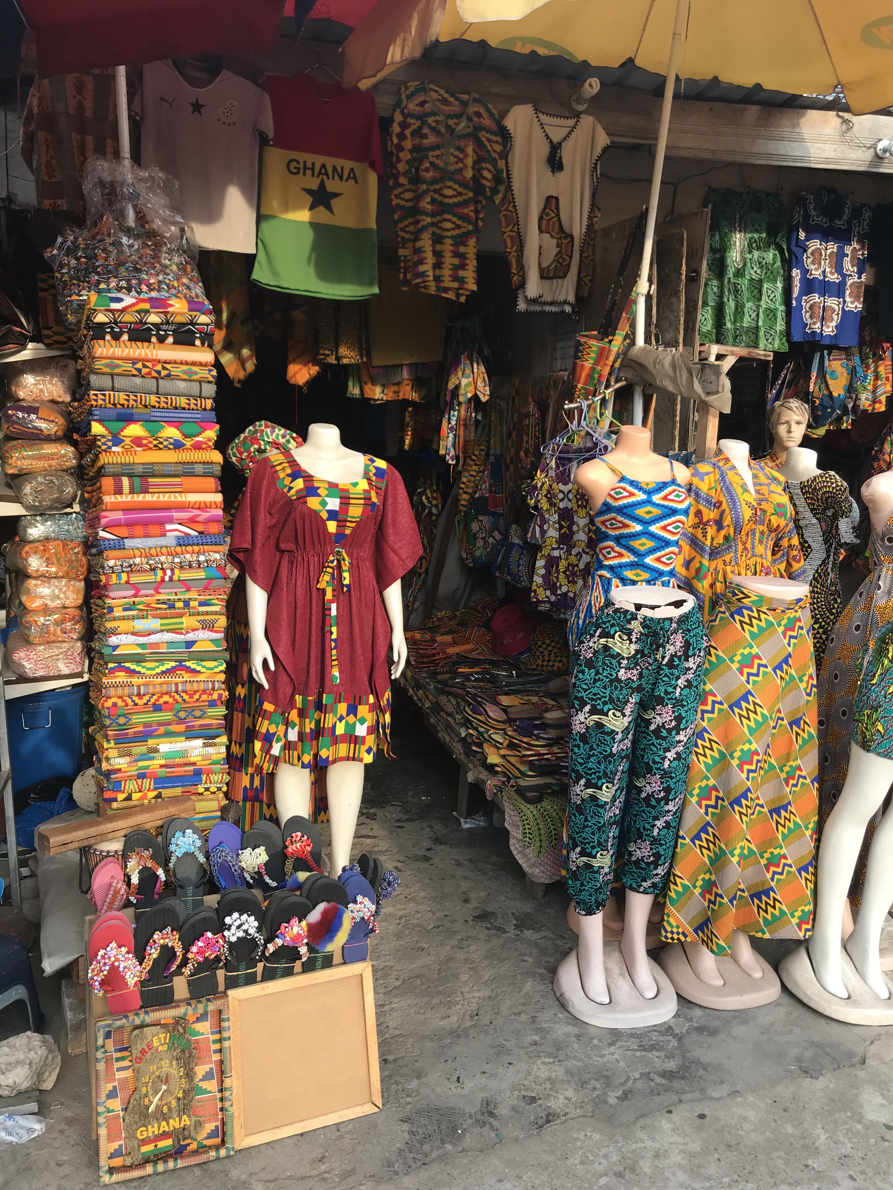 Ghanaian clothes and wax print fabric for sale on Accra's Oxford Street