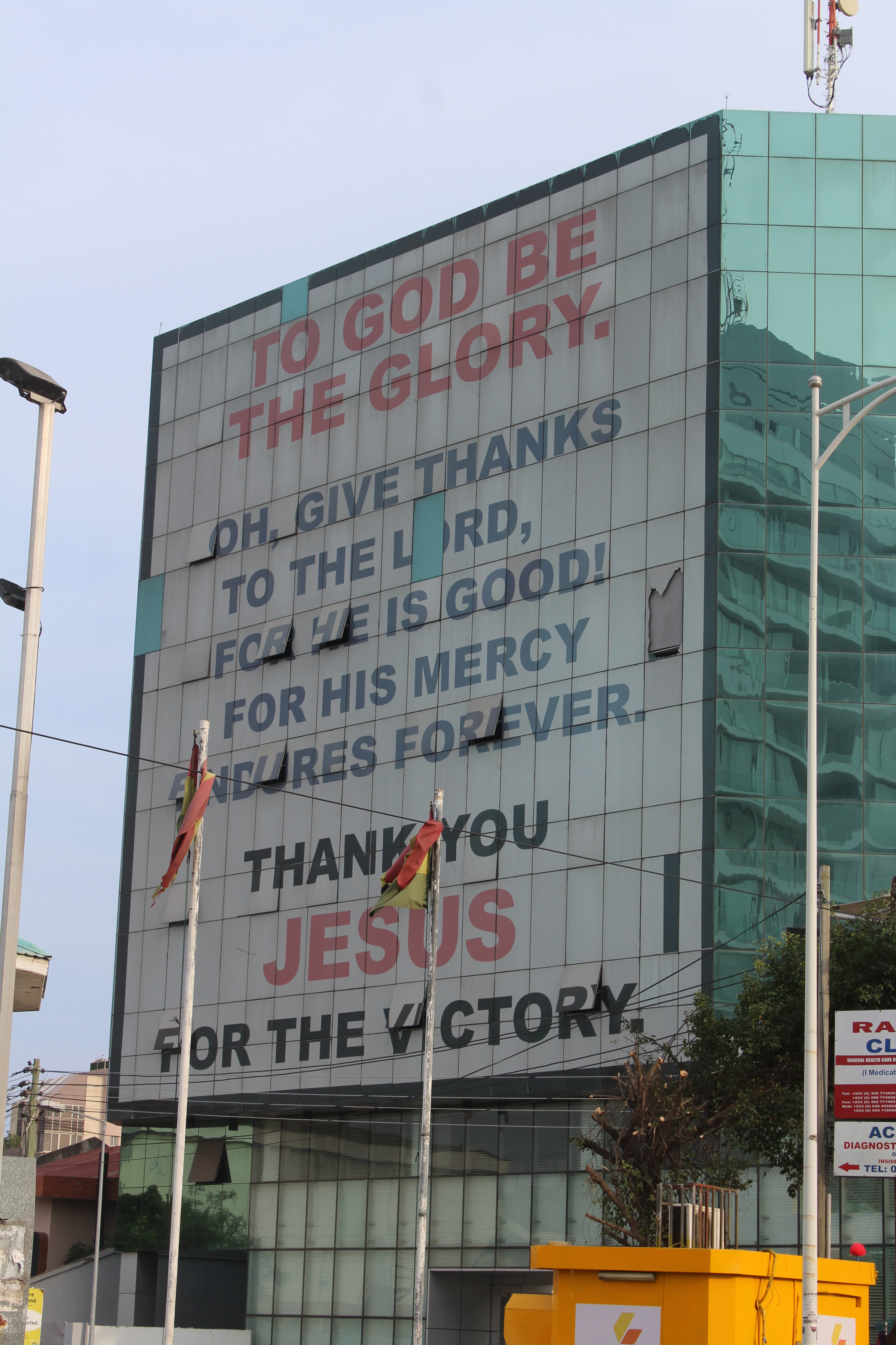 Religious messages are commonplace in Accra Ghana and you can't miss the huge prayer visible on a building on Accra's Oxford Street