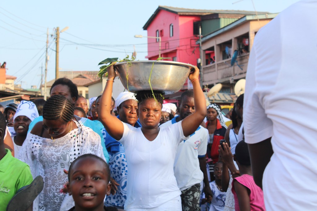 A woman carrying the Tsese at the Ga Mashie Twins Festival in Jamestown Accra