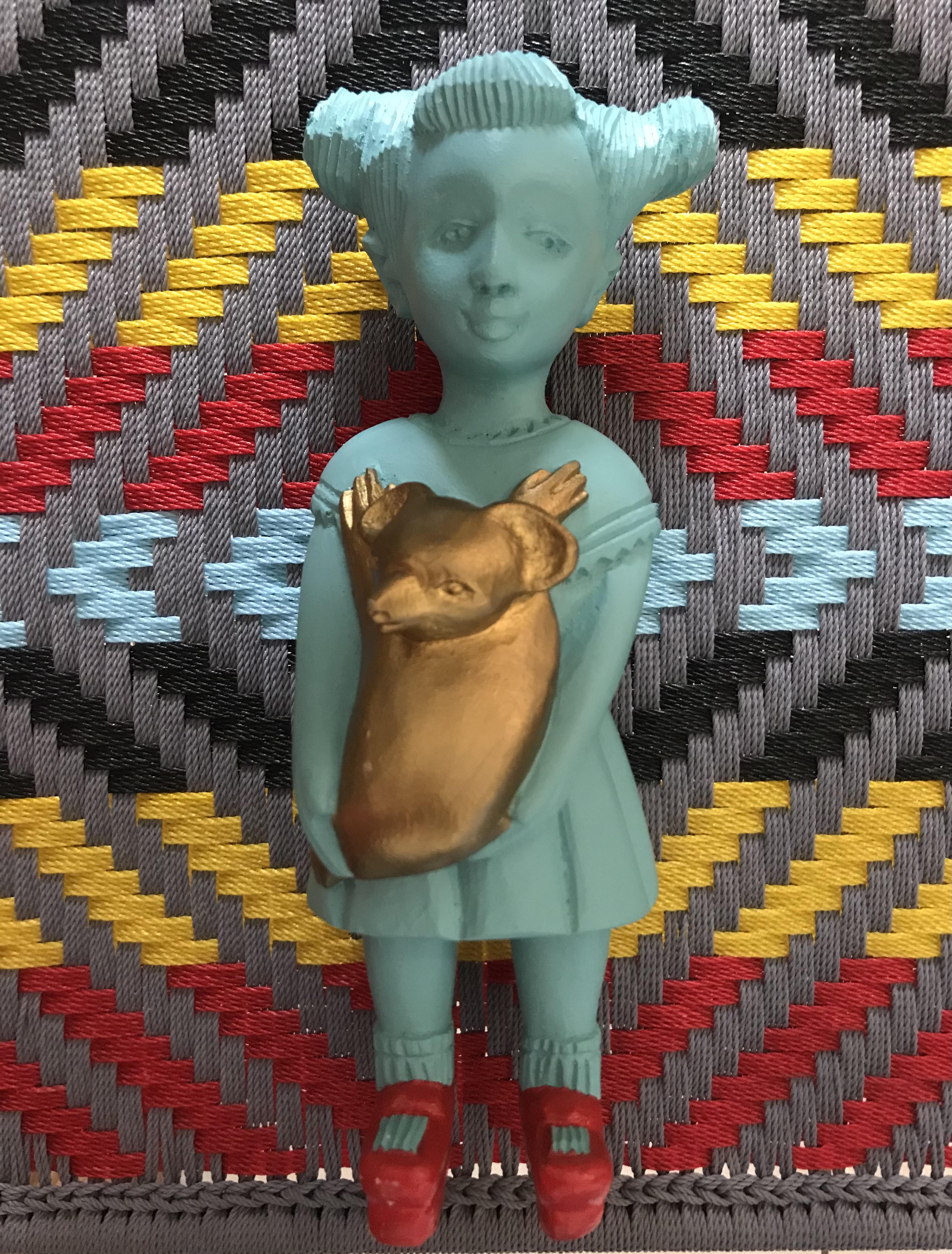 Koala Kate by Noush Projects Manoushka Kraal lies on top of a chair made by Ghanaian Joel of Calao Creations