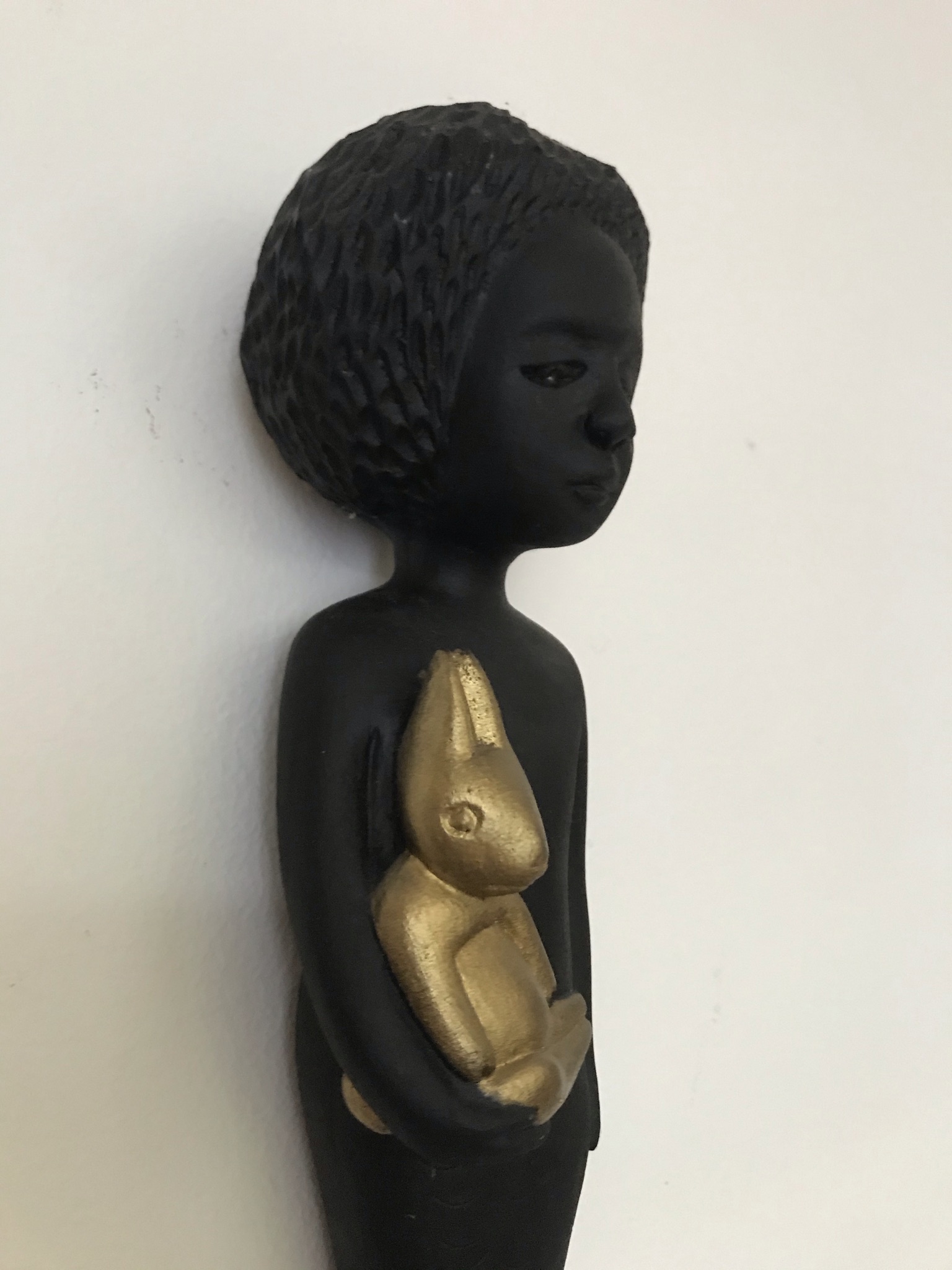 Zodwa the Mermaid made by Manoushka Kraal of Noush Projects rests against a wall