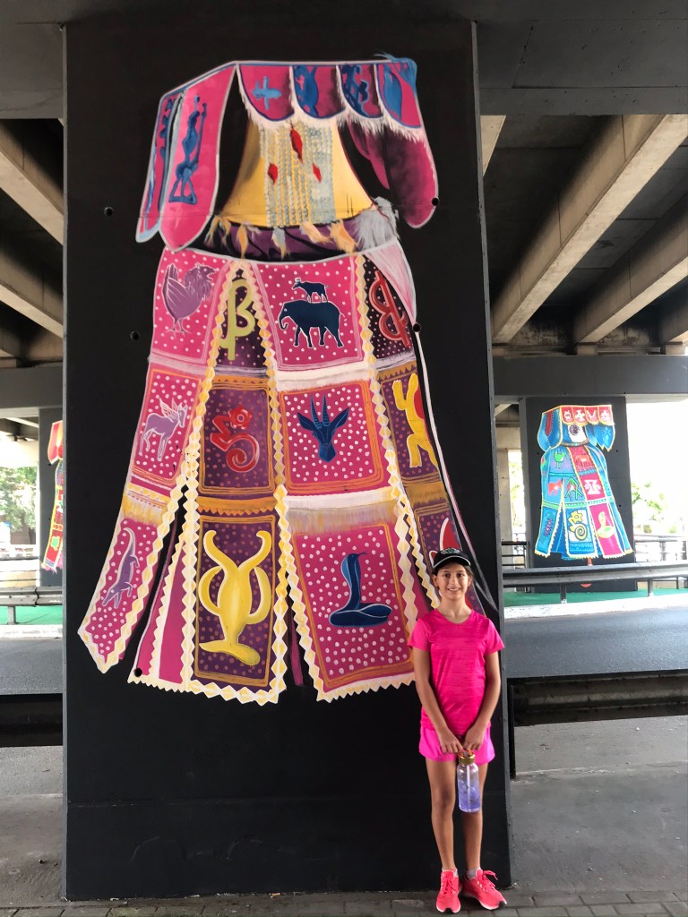 Ghana street art of a cape covering from Benin in Accra Ghana