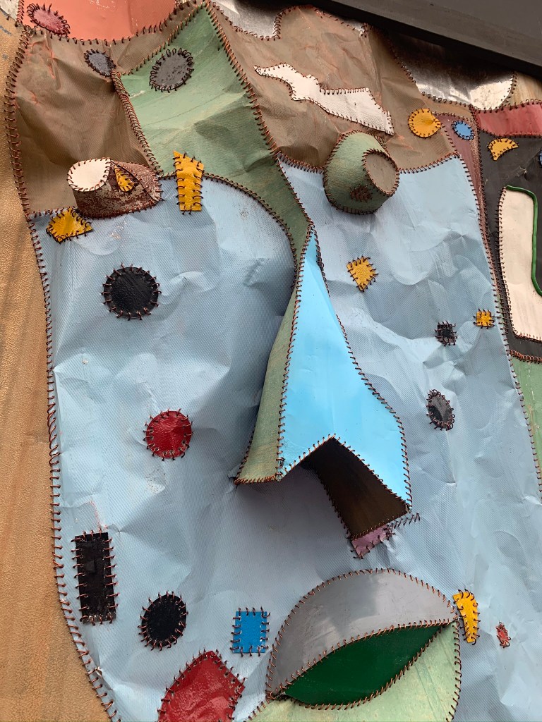 Ghanaian artist Tei Huagie's metal street art in Accra Ghana