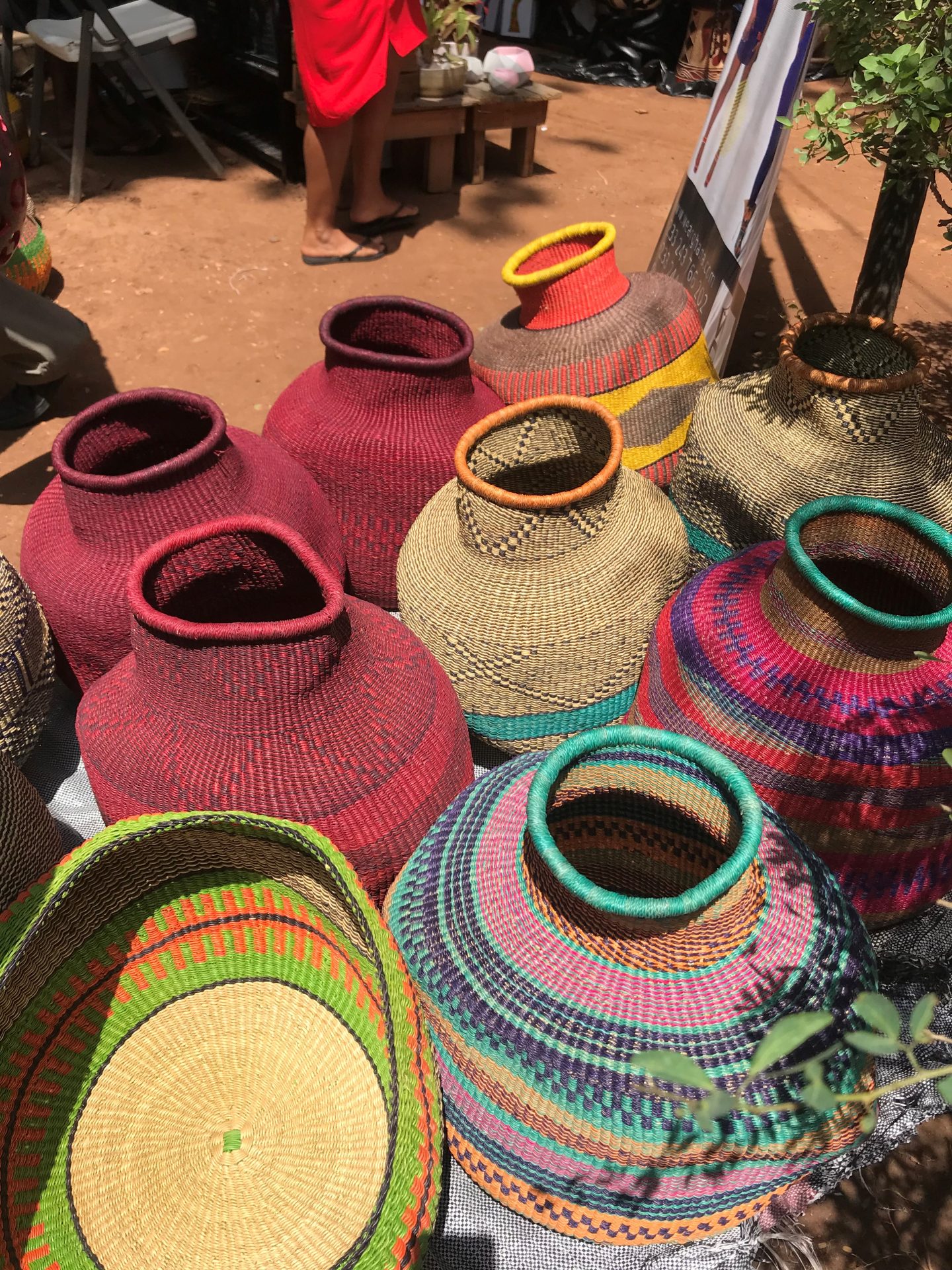 Handwoven colourful baskets for sale at the Green Butterfly Market