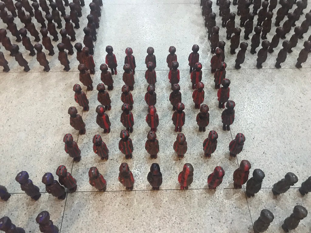 Ghananian Artist Larry Bonchaka's army of Clonette Dolls for Truth or Dare art exhibition