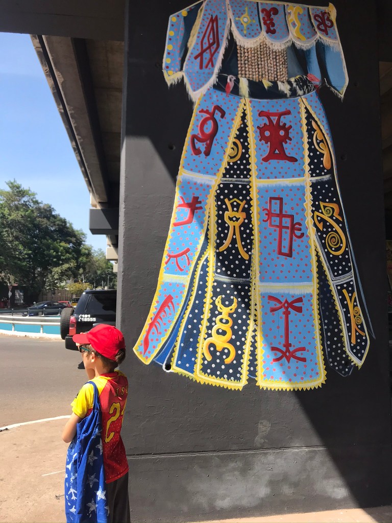 Ghana street art of a cape covering from Benin in Accra Ghana