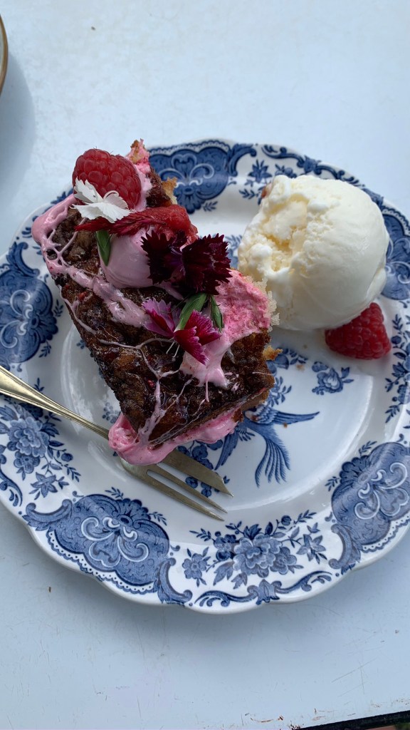 A beautiful slice of cake is served on an antique crockery plate at Crystal Barn Midlands