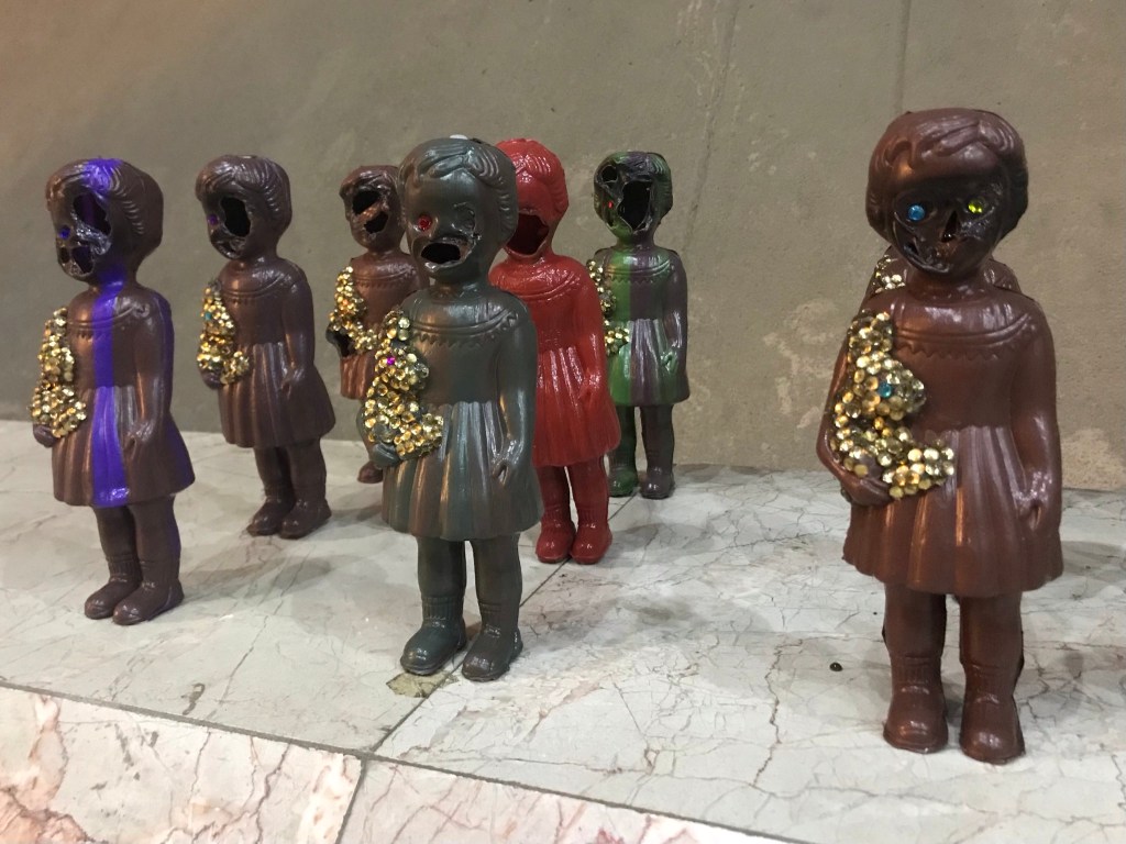Ghananian Artist Larry Bonchaka's embellished and defaced Clonette Dolls for Truth or Dare art exhibition